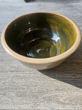 Ceramic bowl with green and  blue glaze. 