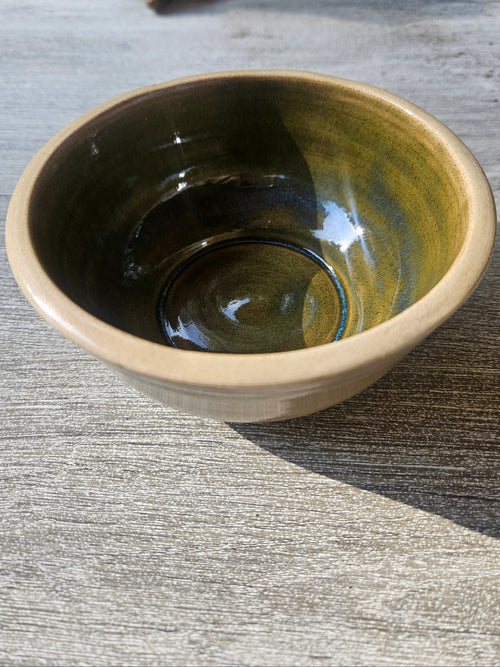 Ceramic bowl with green and  blue glaze. 